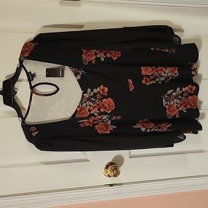 New Torrid black long sleeved blouse with mesh sleeves and rose print size 2